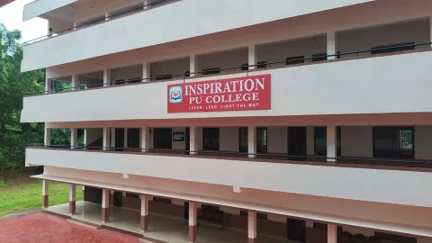 Inspiration PU College main building surrounded by greenery in Puttur Dakshina Kannada